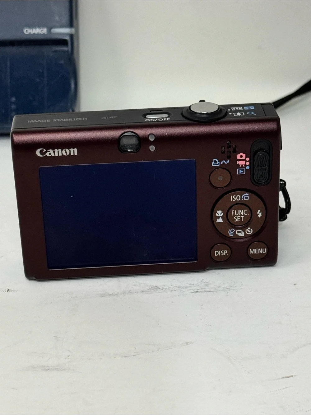 Canon Digital Camera with Charger and Tan Carry Case - Red Camera